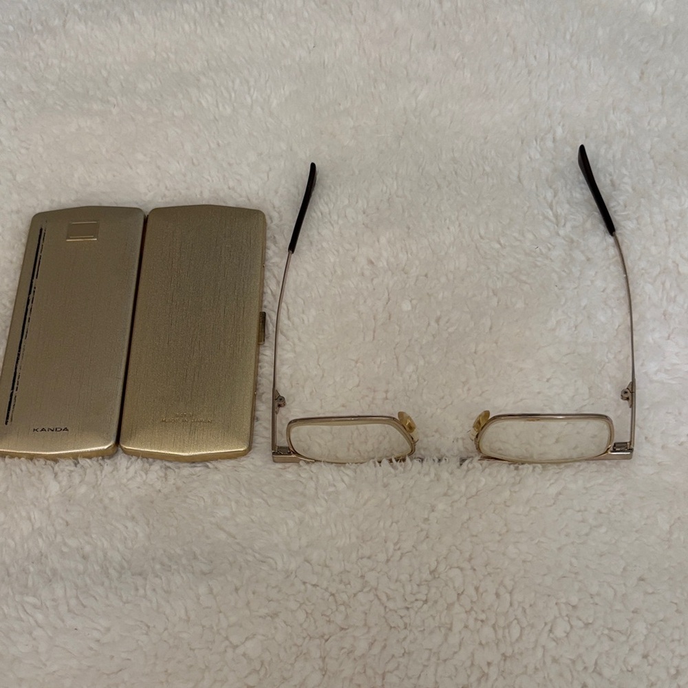 Kanda of Japan slimfold  gold/brown frame and case. Vintage - Rare